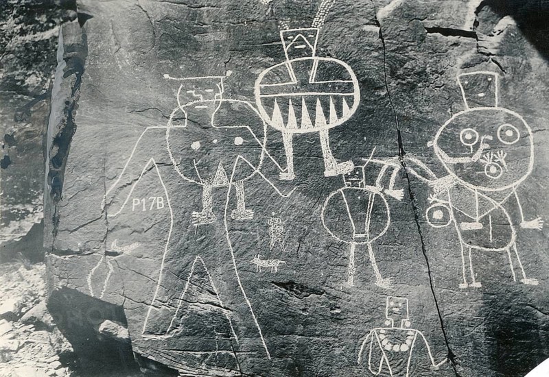 Dry Fork Canyon, Utah, USA, near Vernal, Native Americans, Rock Carvings, Old Petroglyphs with Human-Like Figures and Symbols on a Rock Wall, 1938