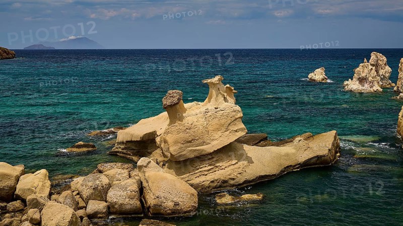 Natural coast with distinctive rock formations and turquoise blue sea, Aspragremna, White Cliffs, Mavorspilia Beach, Kimolos Island, Kimolos, Cyclades, Greek Islands, Greece