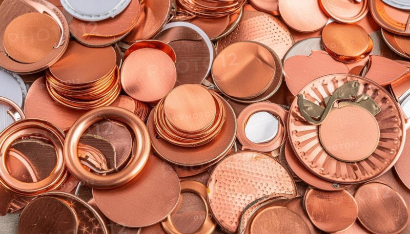 Material, metal, copper, a large amount of metal waste, production waste, from copper on a heap for recycling