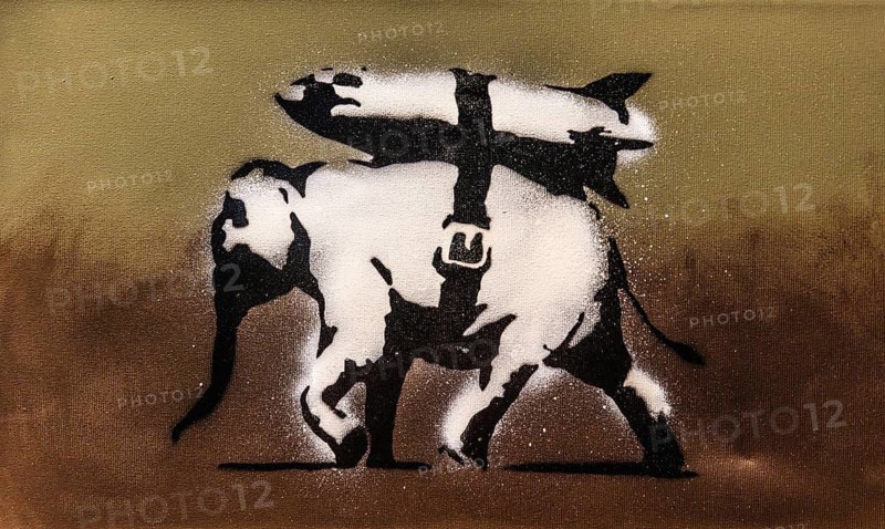 Banksy - Heavy Weaporny, Elephant with rocket, 2003, exhibition The World of Banksy