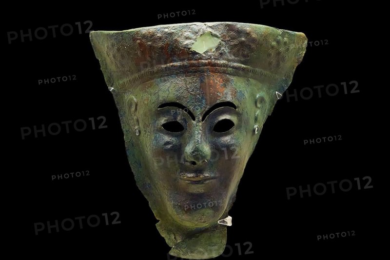 Hammered bronze mask of a wooden statuette, A mysterious ancient metal mask with greenish erosion, Olympia Archaeological Museum, Ancient Olympia, Olympia, Peloponnese, Greece