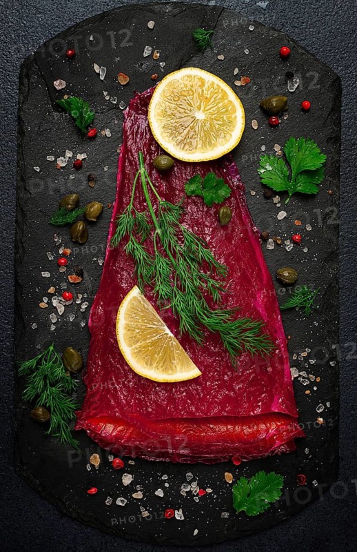 Salmon gravlax with beetroot, Scandinavian snack, beet gravlax, lightly salted fish, homemade, no people