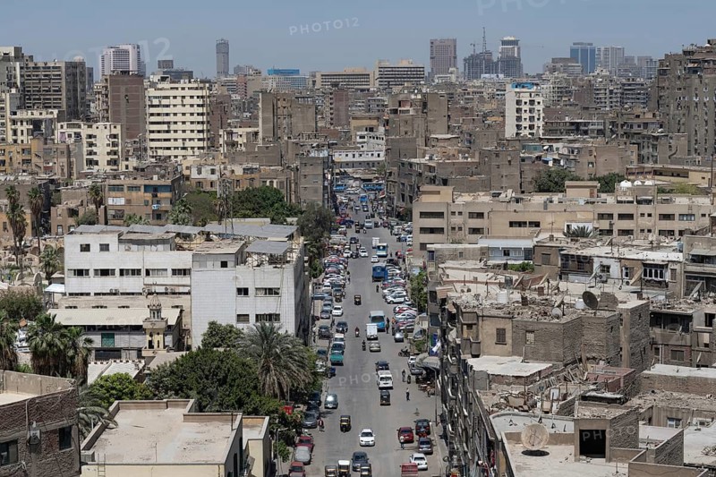 Cairo, Egypt. April 16th 2025. Aerial rooftop view of the densely populated Egyptian capital city Cairo, a sprawling metropolis beside the River Nile in North Africa