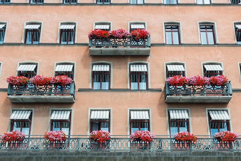 Facade of a hotel, window, balcony, building, property, magnificent, hotel, tourism, travel, architecture, historical, architectural style, building, flowers, red, decorated, lovely, Stockholm, Sweden