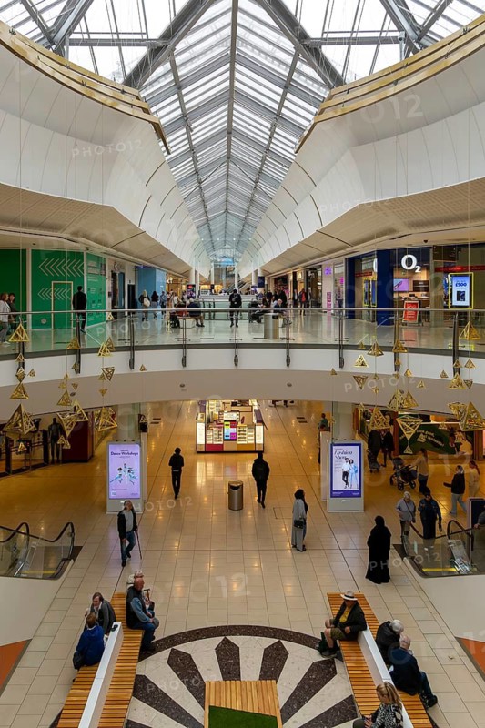 People and shops inside Lakeside shopping centre, West Thurrock, Essex, England, UK