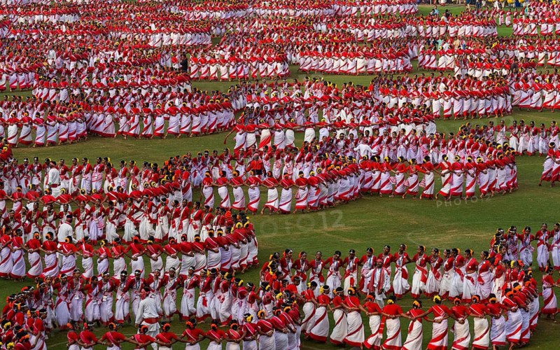 Several thousands of dancers perform traditional Jhumur dance, as they full dress rehearse on the eve of 'Jhumoir Binandini' event at the Sarusajai Stadium in Guwahati, India on February 23, 2025. Jhumur Dance is a traditional folk dance popular in Assam, West Bengal, Jharkhand, and Odisha, mainly performed by the Adivasi (Tea Tribe) community and other indigenous groups
