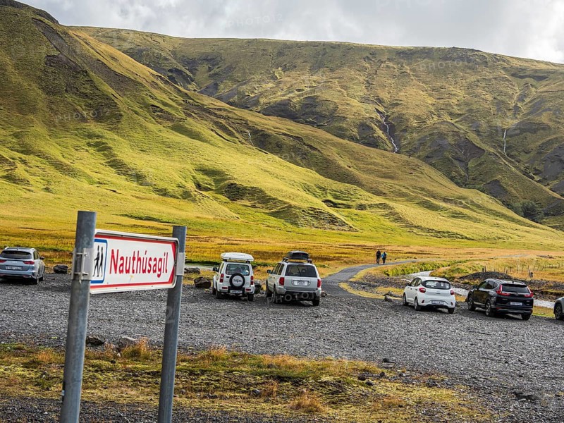 Signpost at parking lot of gorge Nauthusagil, hiking path, Katla Geopark, Iceland