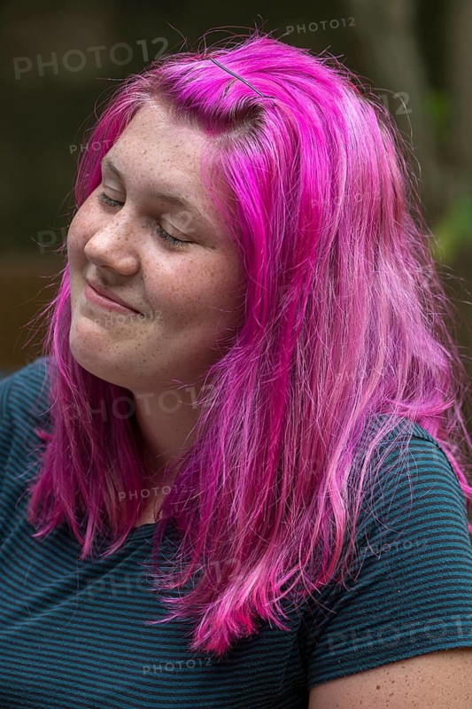 Portrait of a young woman with freckles and violet-colored hair, Ringsheim, Baden-Württemberg, Germany