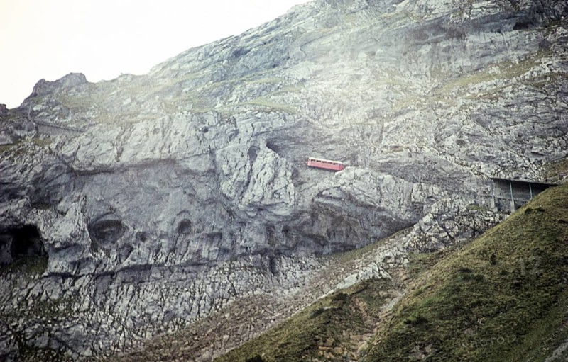 Train entering a tunnel of the Pilatus mountain railway, Switzerland, Europe. 1959