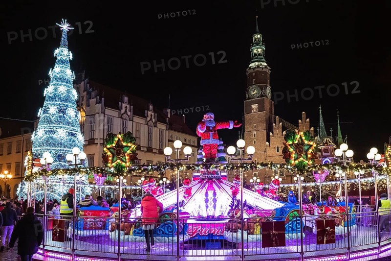WROCLAW, POLAND - DECEMBER 09, 2018: Christmas fair in the market square of Wroclaw with the christmas tree and carousel