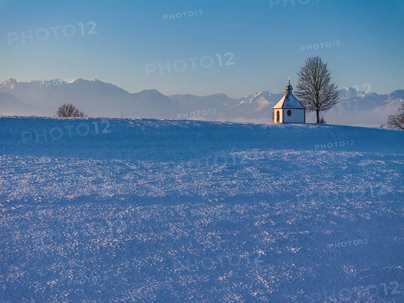 Chapel, tree, morning light, winter, snow, mountain landscape, near Riegsee, behind Zugspitze, Alpine foothills, Bavaria, Germany