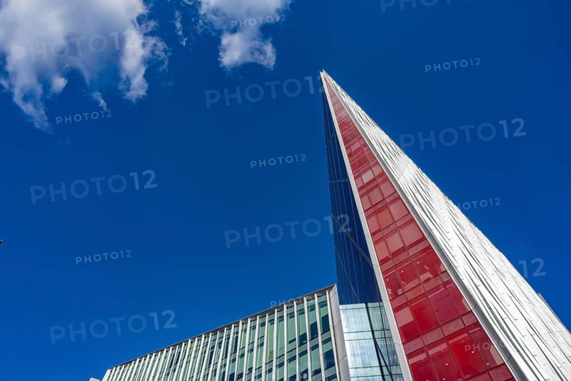 A Modern futuristic designed commercial office high rise building in the city of London, capital of the United Kingdom