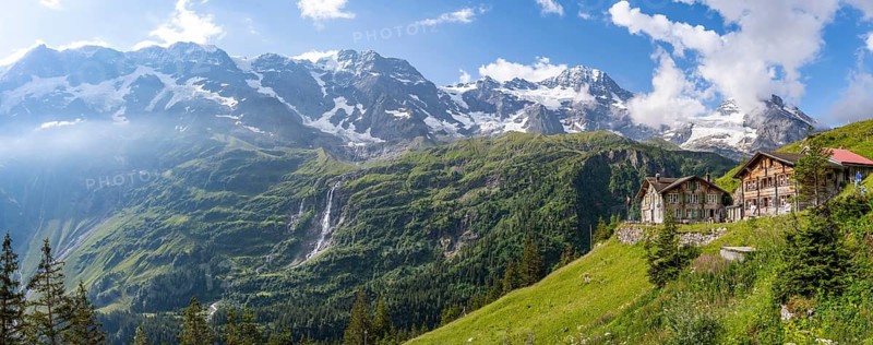 Panorama, picturesque mountain landscape with Berghotel Obersteinberg, Schmadribachfall waterfall and Breithorn and Tschingelhorn mountain peaks, Bernese Alps, Bernese Oberland, Switzerland