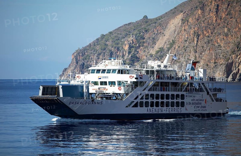 Ferry on the Libyan Sea with the Lefkia Ori or White Mountains in the background, Crete, Greece