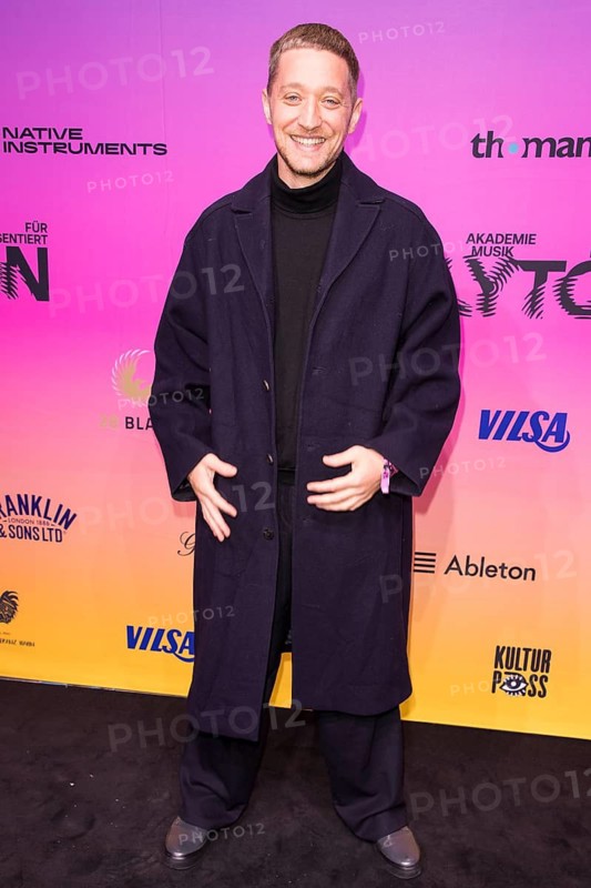 Maeckes on the red carpet in front of the Polyton 2024 award ceremony in Berlin's Atelier Gardens on 23 October 2024. The award has been taking place since 2023 and is a successor to the Echo music award