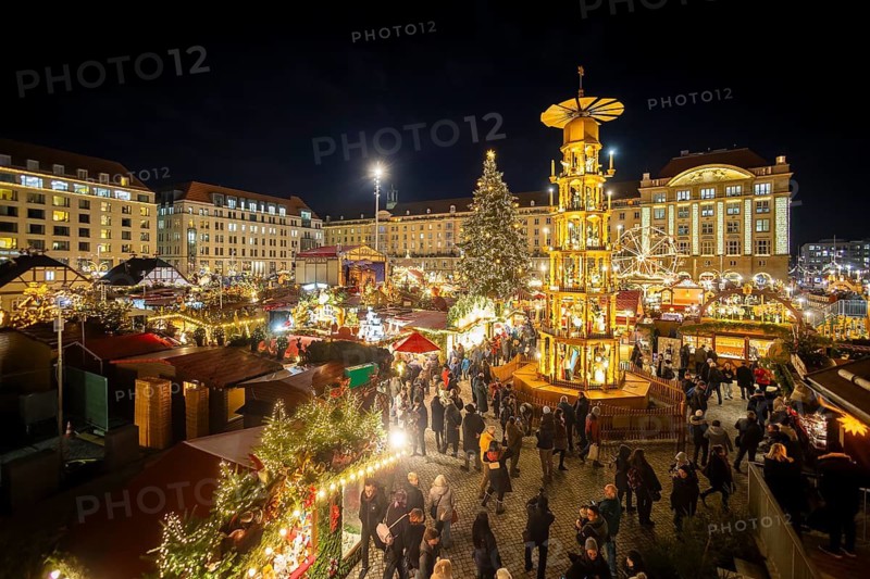 Dresden's Striezel Market has been held mostly on the Altmarkt since 1434 during Advent and attracts an average of around two million visitors a year. It is the oldest Christmas market in Germany, confirmed by a certificate. Great Ore Mountains Pyramid, Dresden, Saxony, Germany