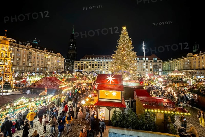 The Dresden Striezelmarkt is a Christmas market in Dresden. It has been held in Advent since 1434, usually on the Altmarkt square, and attracts an average of around two million visitors every year. It is the oldest certified Christmas market in Germany. Christmas tree. Dresden, Saxony, Germany