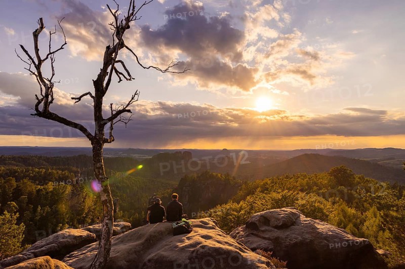 Sunset on the Carola Rock in Saxon Switzerland View of the Schrammsteine, the Königstein Fortress, the Falkenstein and the Lilienstein, Bad Schandau, Saxony, Germany