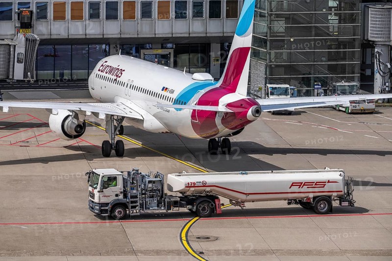 Tankers at Düsseldorf Airport, DUS, bring aviation fuel, kerosene from the tank farm to the aircraft, Eurowings Airbus, North Rhine-Westphalia, Germany