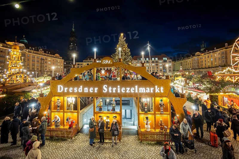 Dresden's Striezel Market has been held mostly on the Altmarkt since 1434 during Advent and attracts an average of around two million visitors a year. It is the oldest Christmas market in Germany, confirmed by a certificate. Großer begehbarer Schwibbogen, Dresden, Saxony, Germany
