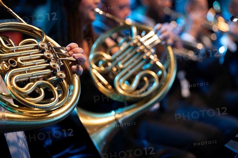 Close-up of a French horn in the hands of a musician during a brass band concert in Lubin, Poland