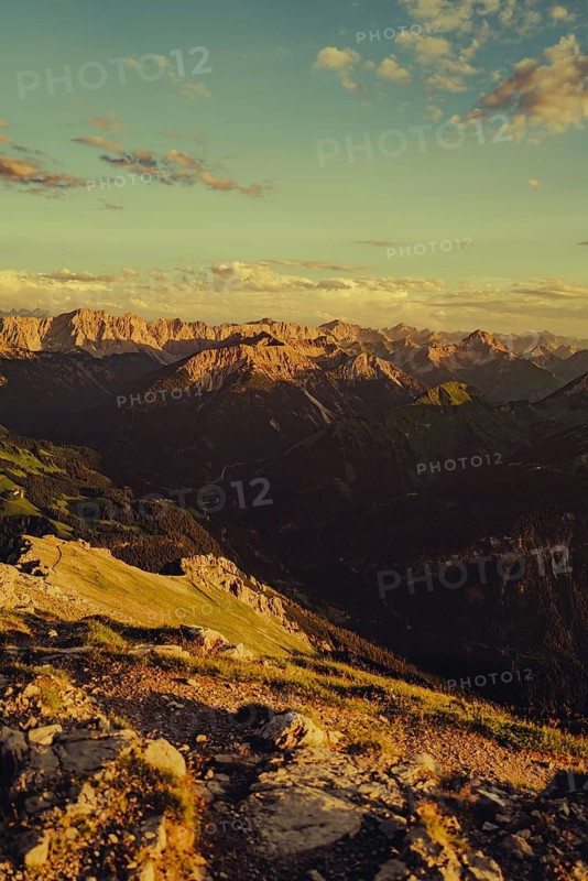 Thaneller summit at sunset in the Lechtal valley in Tyrol with a wonderful view of the surrounding mountains. Tyrol, Austria