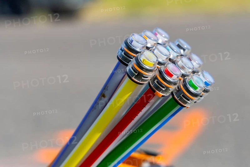 Fibre optic cable sleeves at the roadside in Struppen in Saxon Switzerland. The fibre optic cores will later be blown in there, Struppen, Saxony, Germany