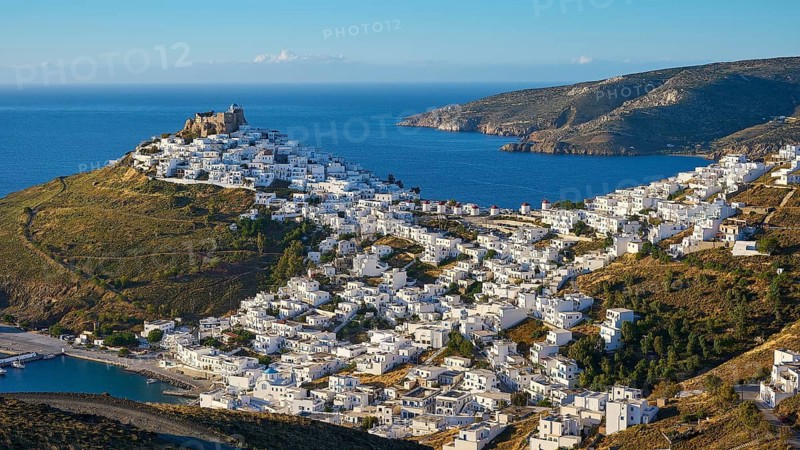 Whitewashed settlement stretches along a hill overlooking the blue Mediterranean, Querini Castle, Chora, Astypalea, Dodecanese, Greek Islands, Greece