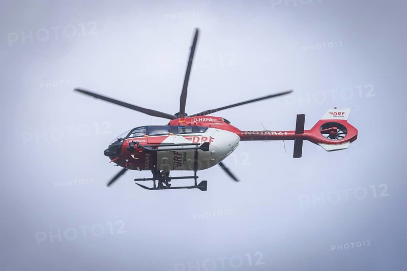 Winch rescue training of the rescue helicopter, Christoph 62, on the occasion of the 50th anniversary of the DRF Luftrettung. The rescue of casualties in the Elbe Sandstone Mountains will be practised