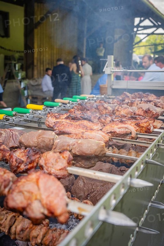 Juicy pieces of meat on skewers, barbecue party, people in the background, wedding, Grossglattbach, Germany