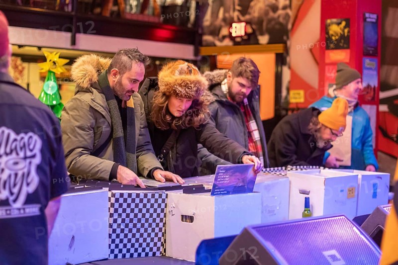 Detroit, Michigan - People shopped for vinyl records at Third Man Records on Noel Night. The annual Noel Night at the start of the holiday season in Detroit features open houses by arts and cultural institutions, churches, and small businesses.