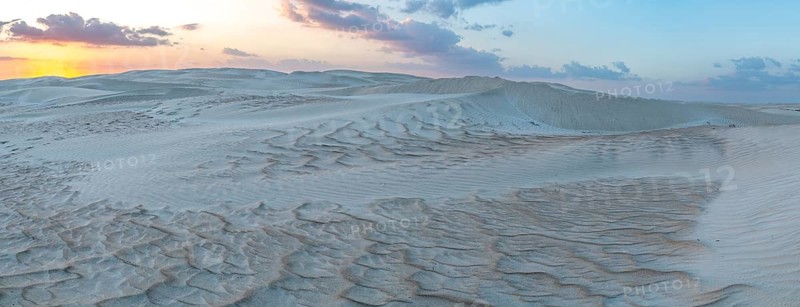 Sunset, white sand dunes in the Khaluf desert, Oman