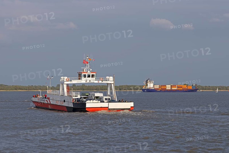 FRS Elbe ferry on the way to Glückstadt, container ship Nata A. Monrovia near Glückstadt, Schleswig-Holstein, Germany