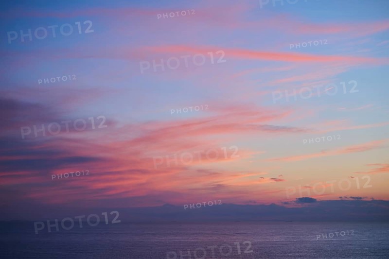 Colored clouds at sunset over the sea, wildlife, Helgoland, Germany