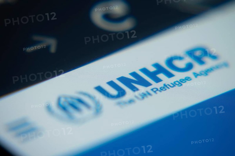 Dhaka, Bangladesh- 02 Dec 2025: A Close-up of a laptop screen is displaying the UNHCR web interface in a browser