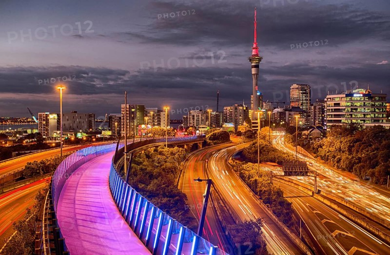 View towards the motorway and light path with sky tower in Auckland, New Zealand