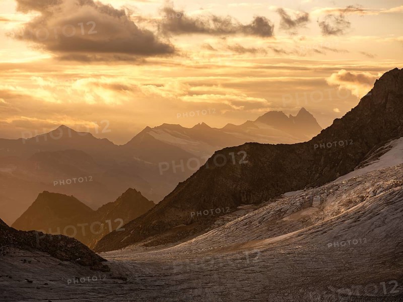 Glaciated mountains at sunrise, Grossglockner in the background, Venice Group, Hohe Tauern National Park, Salzburg Province, Austria