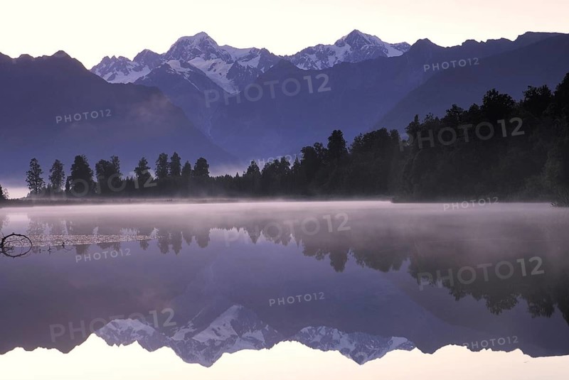 Mt Tasman and Mt Cook (Aoraki), Mount Cook National Park, are reflected in Lake Matheson, Westland National Park, South West New Zealand World Heritage Site, Southern Alps, West Coast, South Island of New Zealand