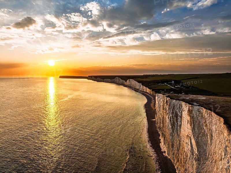 Sunset over Seven Sisters Cliffs from a drone, English Channel, East Sussex, South-east England