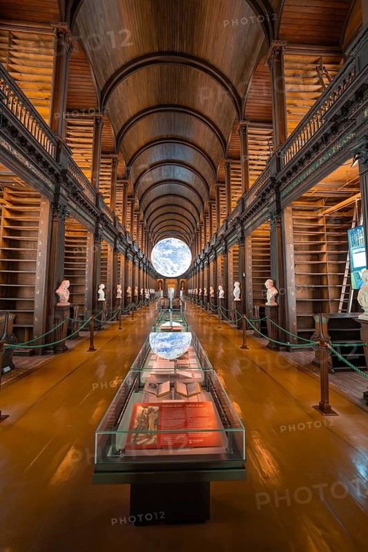 Library room with exhibited globe and old book collection, Trinity Collage, Dublin, Ireland