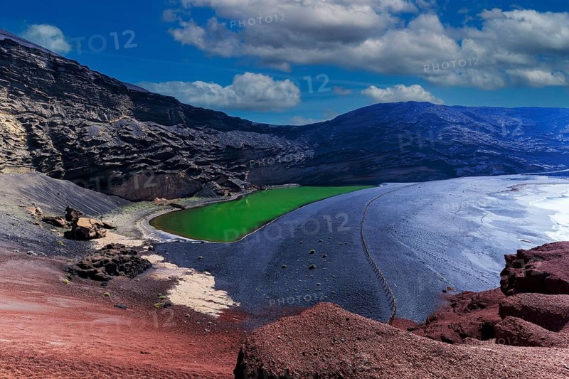 Lanzarote, Canary Islands, Spain, Europe, Bizarre volcanic landscape with green lake and colorful rocks