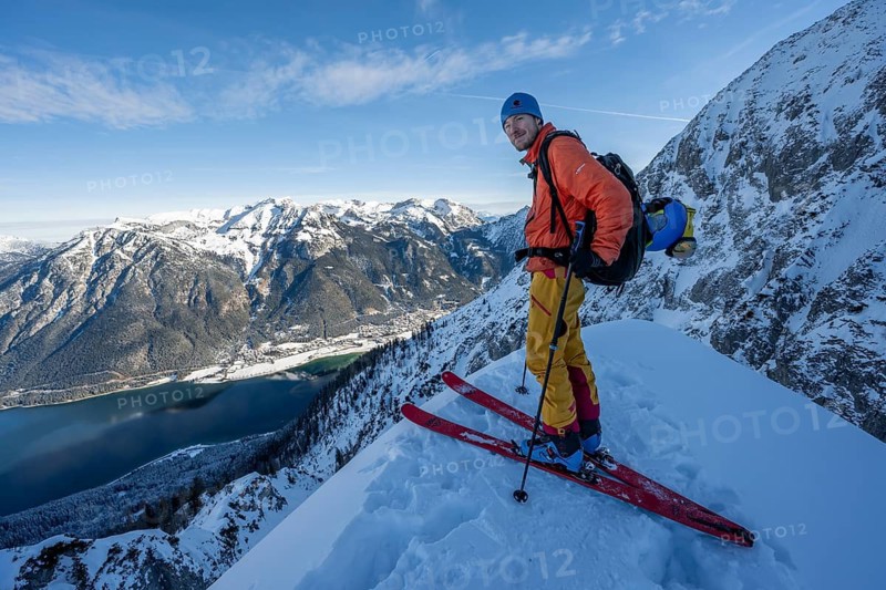 View of Achensee, ski tourers climbing to Bärenkopf, Achensee, Tyrol, Austria