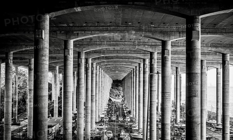 Supports under the runway of Funchal airport, black in Madeira, Portugal