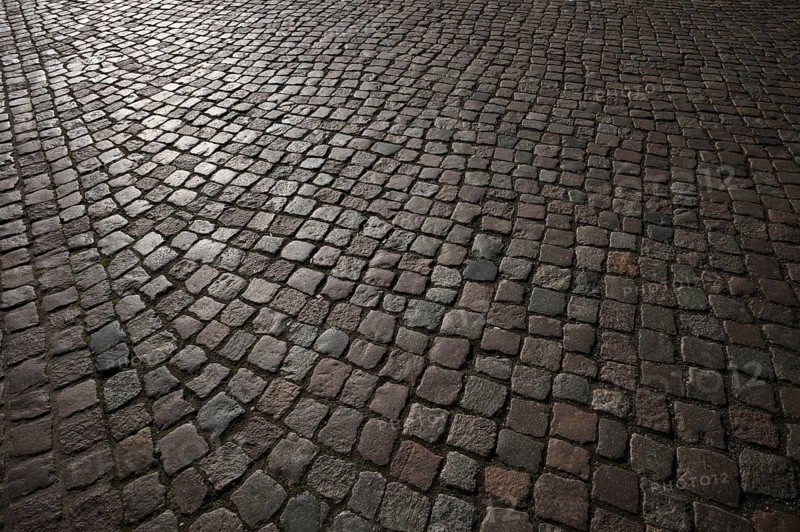 Cobblestones, street pavement, back light, Luther city Wittenberg, Saxony-Anhalt, Germany