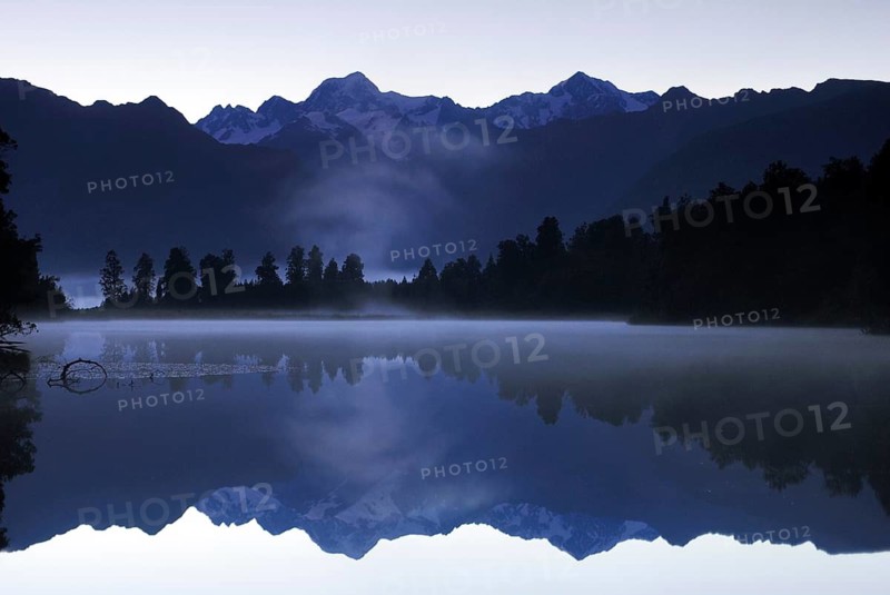 Mt Tasman and Mt Cook (Aoraki), Mount Cook National Park, are reflected in Lake Matheson, Westland National Park, South West New Zealand World Heritage Site, Southern Alps, West Coast, South Island, New Zealand