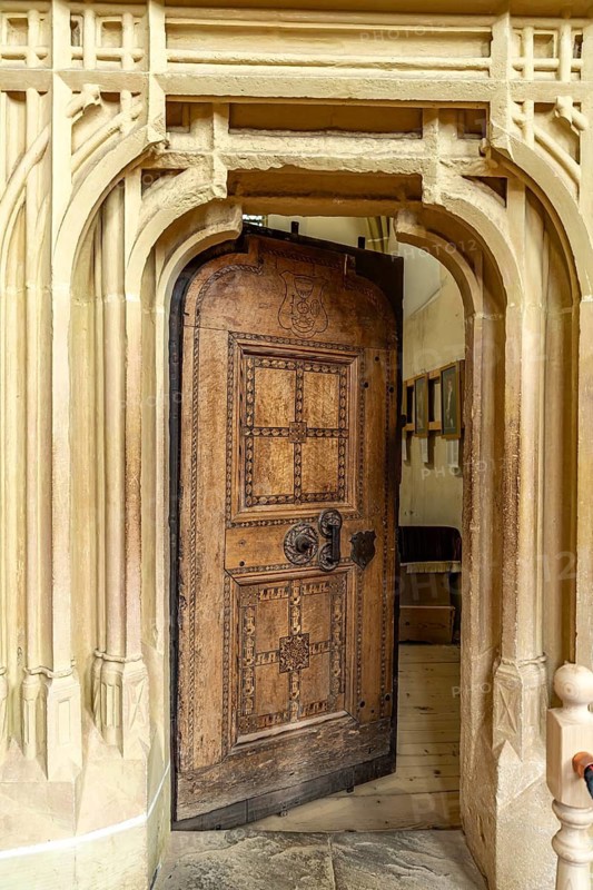 Richly decorated sacristy door from 1515 in the interior of the Biertan fortified church, UNESCO World Heritage Site in Biertan or Birthälm, Transylvania, Romania