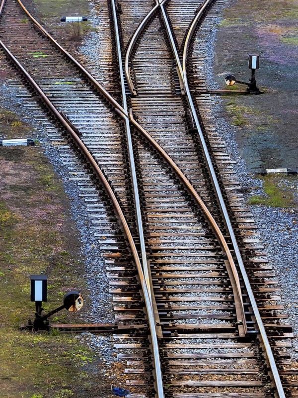 Switch on railroad tracks. Symbolic photo for decision, separation and community