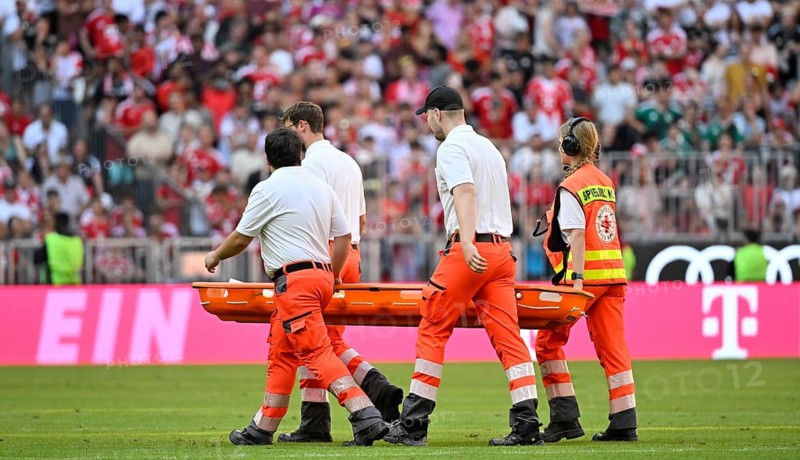 Paramedics wear stretchers to transport, soccer, Telekom Cup, Allianz Arena, Munich, Bavaria, Germany