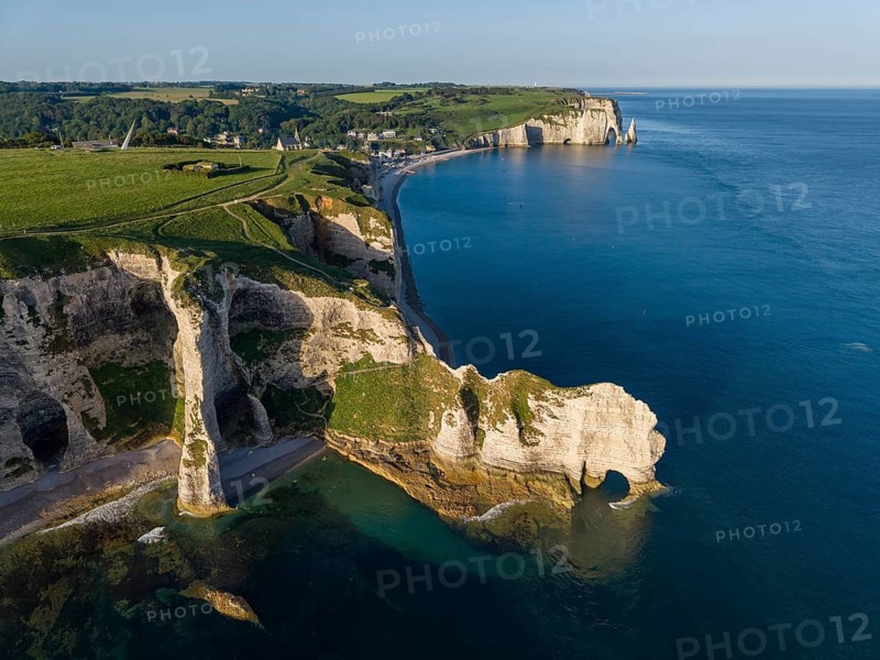 Aerial view of the Falaise d'Amont rock formation with the Porte d'Amont rock gate, Porte d'Aval rock formation, Étretat, Alabaster Coast, La Côte d'Albâtre, chalk cliffs, English Channel, Seine-Maritime, Normandy, France