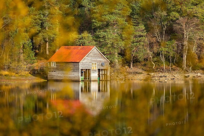Boathouse on the shores of a lake in Scotland, Aviemore, Scotland, Great Britain